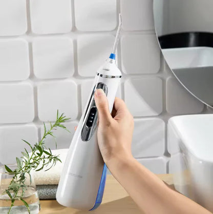 جهاز تنظيف الأسنان بالماء المحمول ووتر بلس - V400 بلس